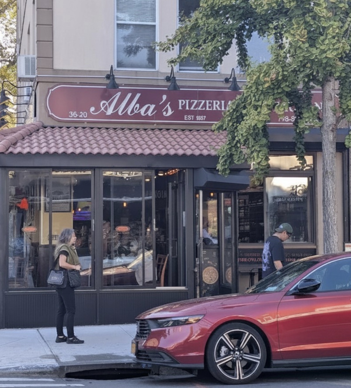 Alba's Pizzeria storefront on Ditmars Boulevard